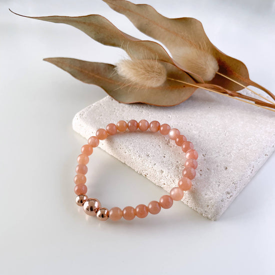 Load image into Gallery viewer, Peach Moonstone &amp;amp; 14k Rose Gold Trinity Beaded Bracelet
